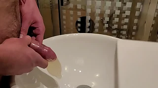 Pissing median a used condom